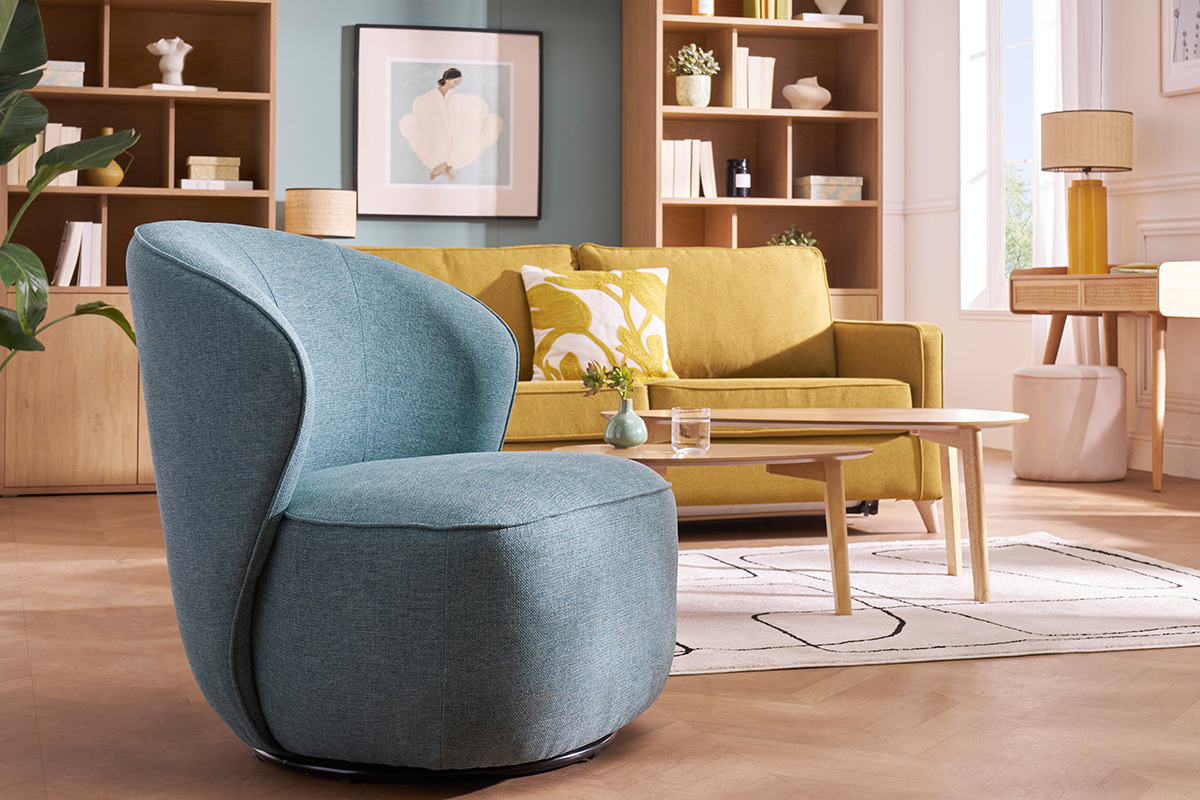 Fauteuil design pivotant en tissu vert de gris AMBER